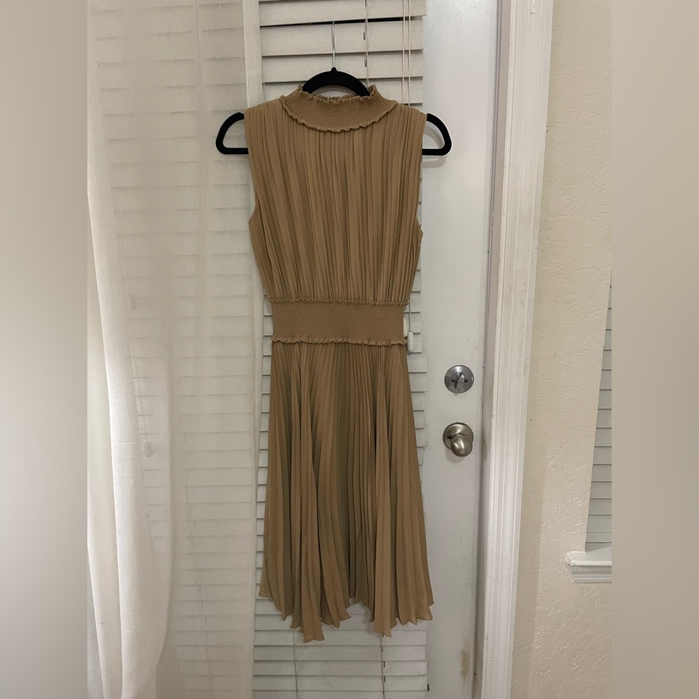 Pleated tan sleeveless dress